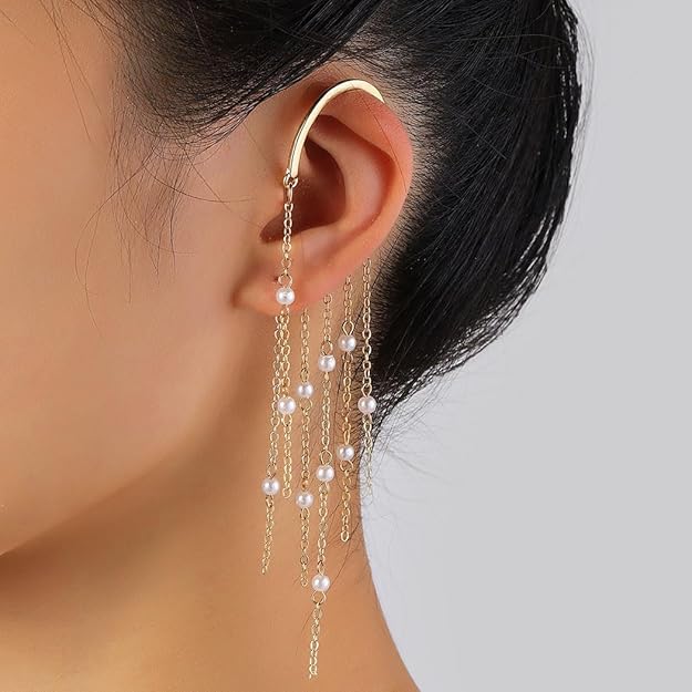 girl wearing gold pearl ear cuffs with long tassel dangle earrings