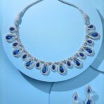 blue stone rhodium jewellery set on aesthetic background elegant necklace earrings set