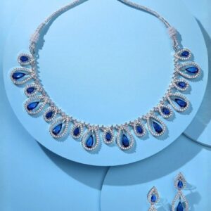 blue stone rhodium jewellery set on aesthetic background elegant necklace earrings set